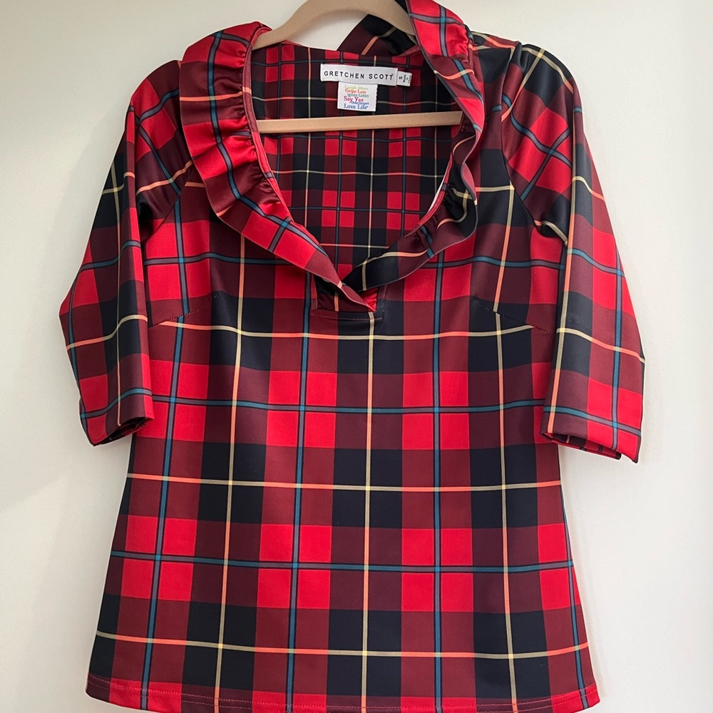 Gretchen Scott red plaid holiday top.